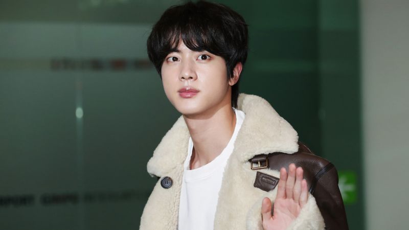Jin begins military service in the beginning of a new era in K-pop.