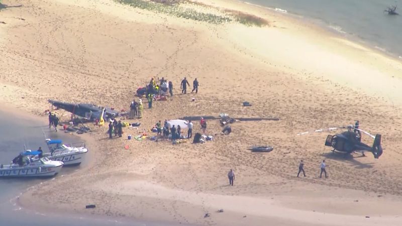 A helicopter crash near Gold Coast has left four people dead and many others injured.