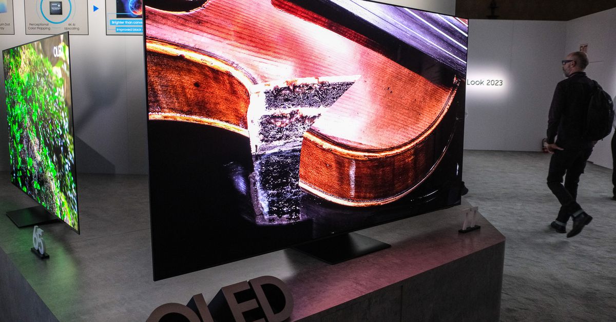 The 77-inch QD-OLED TV is bigger.