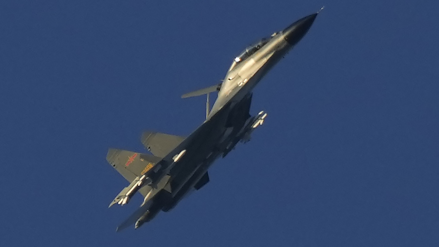 The US Defense Department says a Chinese fighter jet is intercepting US recon aircraft