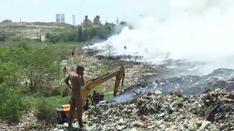 A trash mountain in India is on fire again and Kochi residents are breathing toxic fumes