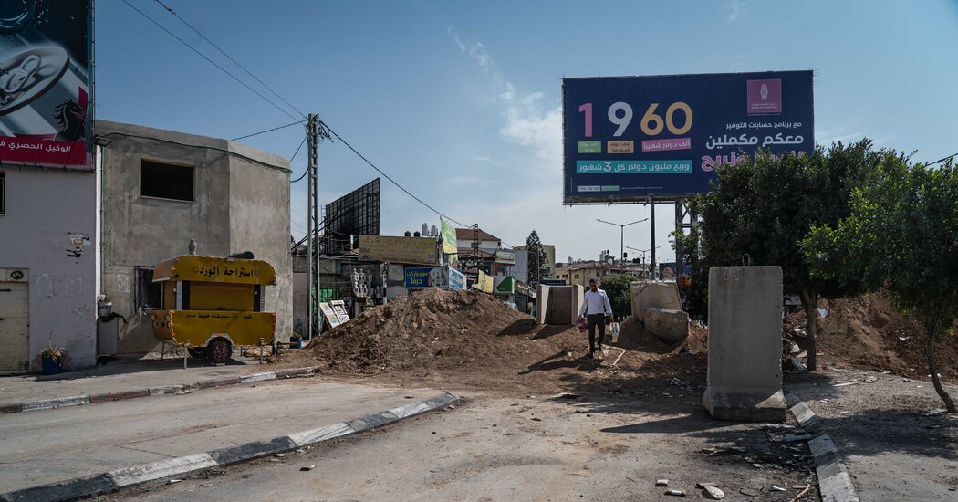 Israel says a man rammed his car into a group of people