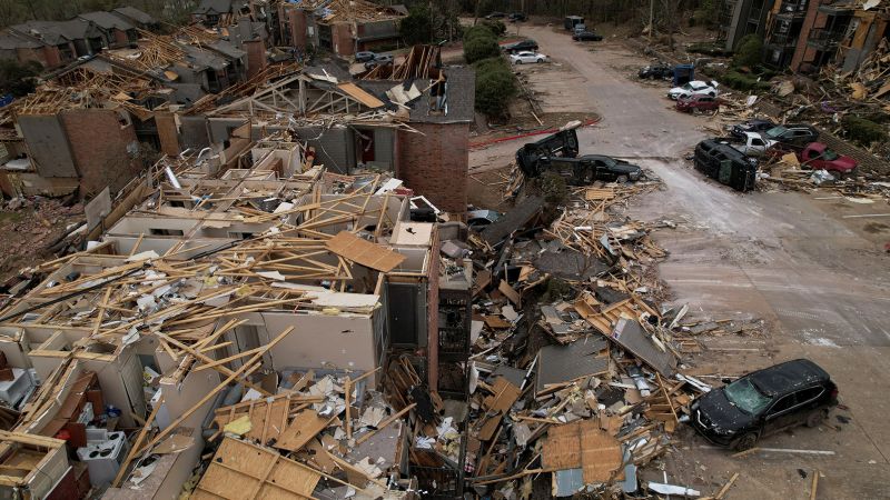 The 32 people that died in the storms were from tornado- ravaged communities