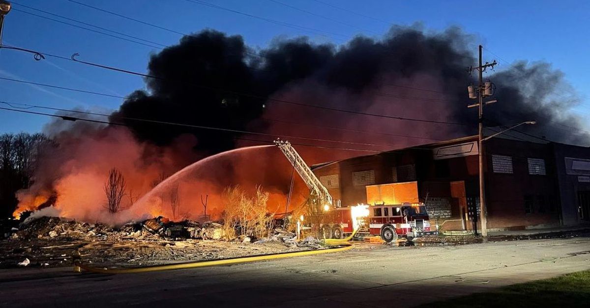 A fire at a recycling plant that was cited for safety precautions has continued for days