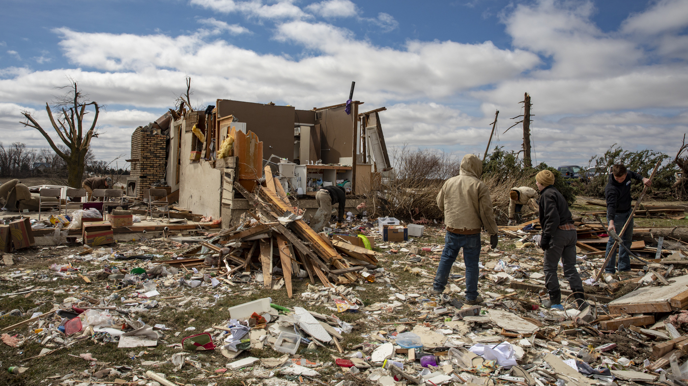 After storms destroyed homes and left 32 people dead, more will be rebuilt